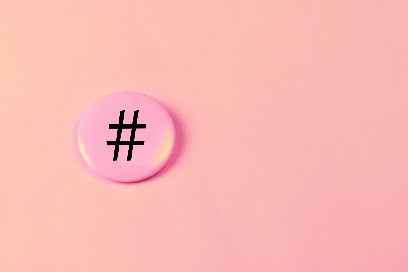 Hashtag sign on iron badge